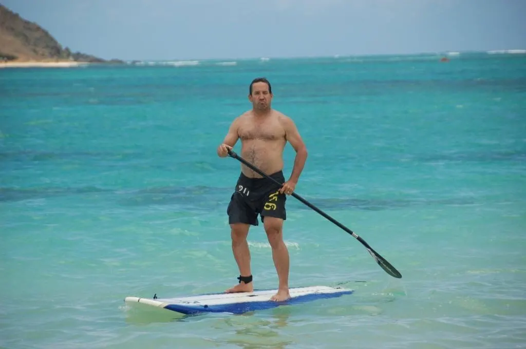 how to stand up paddle board riding the paddle board