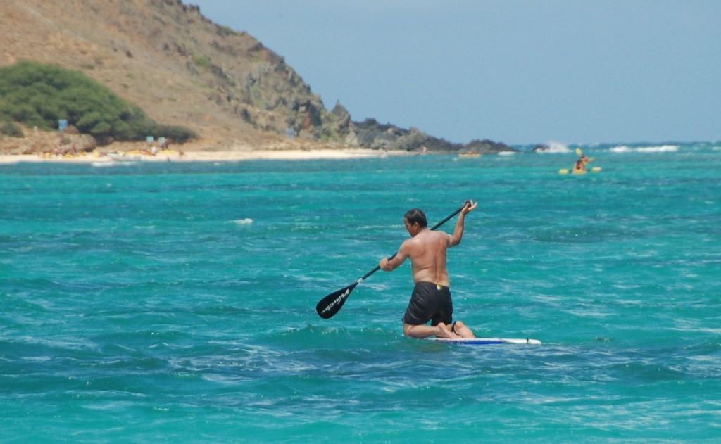 How to stand up paddle board kneeling while paddling out