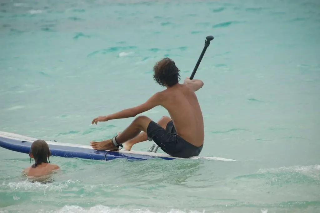 how to stand up paddle board getting up on the board