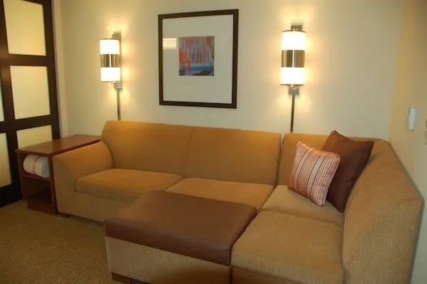 Living area at Hyatt Place hotels. Traveling Well For Less | Hyatt Place Las Vegas review | The Hyatt Place Las Vegas is the best hotel because you get free breakfast, Wi-Fi, parking, airport shuttle, and more