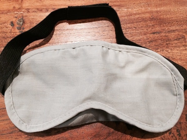 7 things to make a long flight more comfortable eye mask Traveling Well For Less