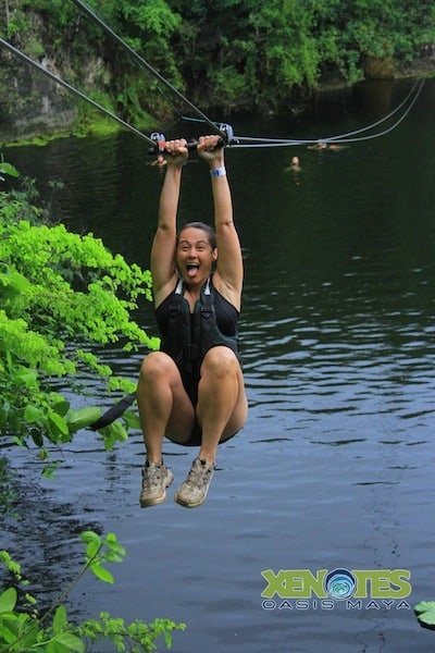 backward zip lining at Lik Xenotes Oasis Maya Traveling Well For Less