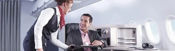 American Airlines changes elite status requirements, combines programs with US Airways Traveling Well For Less