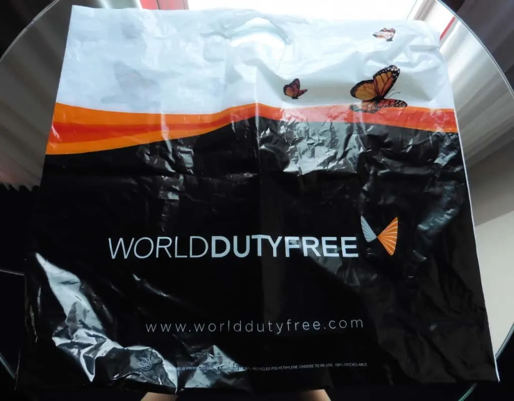shopping at the duty free shop means you won't have to pay baggage fees, how to avoid baggage fees on easyJet, Traveling Well For Less