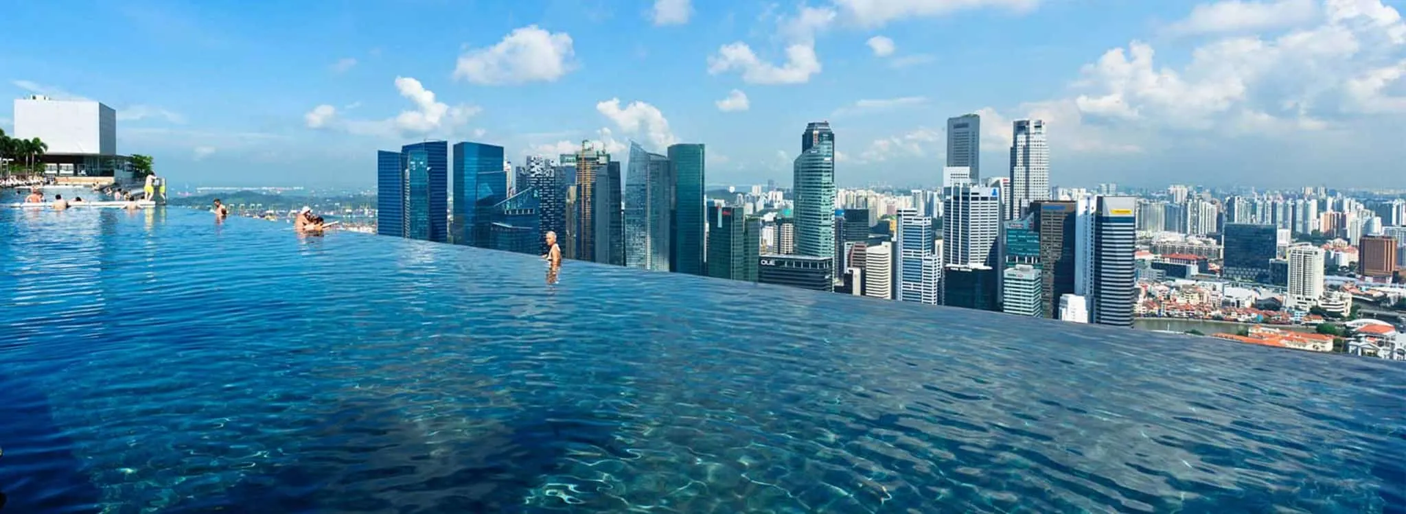 Marina Bay Sands Infinity Pool - the world's largest and highest infinity pool. TravelingWellForLess.com