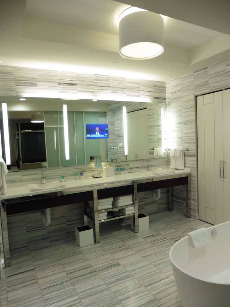 A sunken tub and generous shower add a nice touch to the Park Suite's modern and elegant bathroom. TravelingWellForLess.