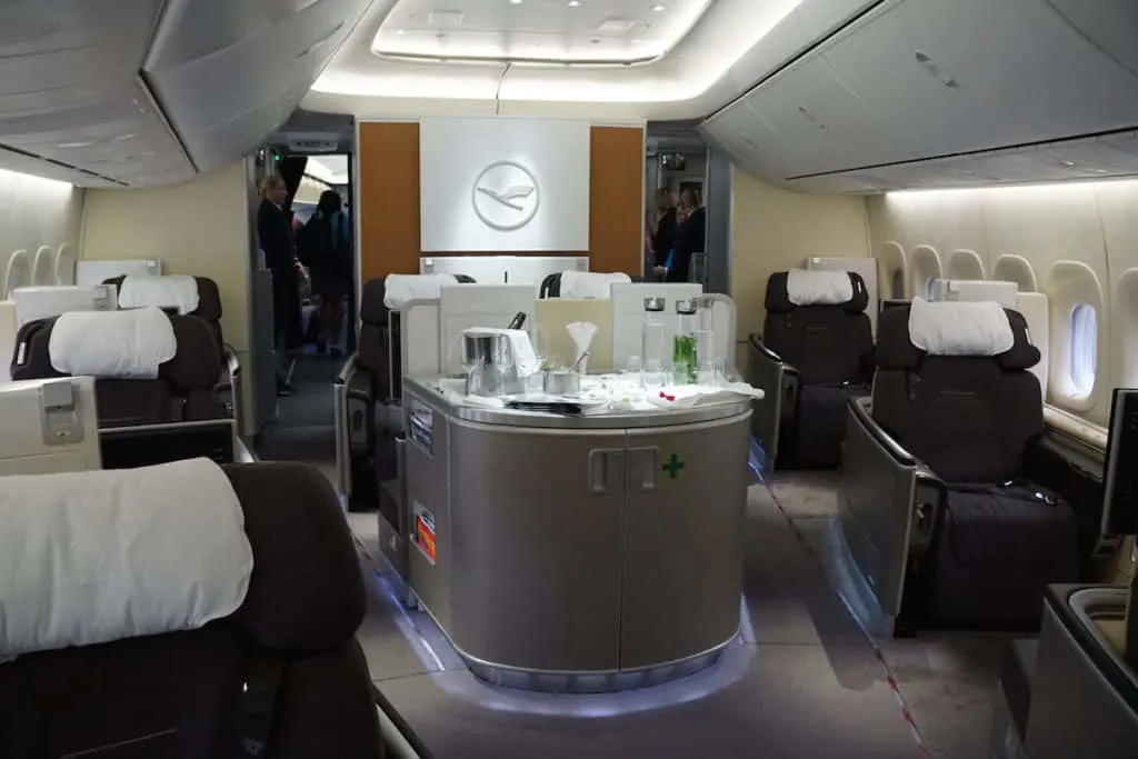 First Class on the Lufthansa 747-8 has 8 seats. https://www.travelingwellforless.com