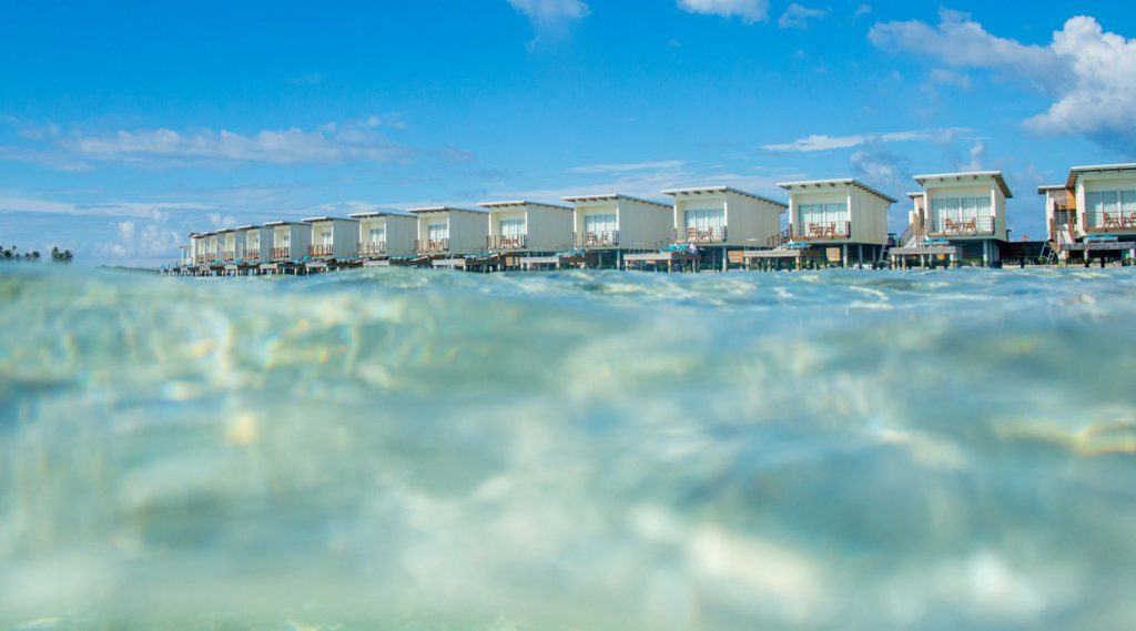 The Holiday Inn Resort Kandooma Maldives is the best value overwater villa in the Maldives. TravelingWellForLess.com