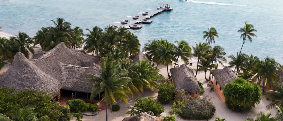 thatched villas on beach overlooking water, oceanfront resort and spa, Matachica resort and spa