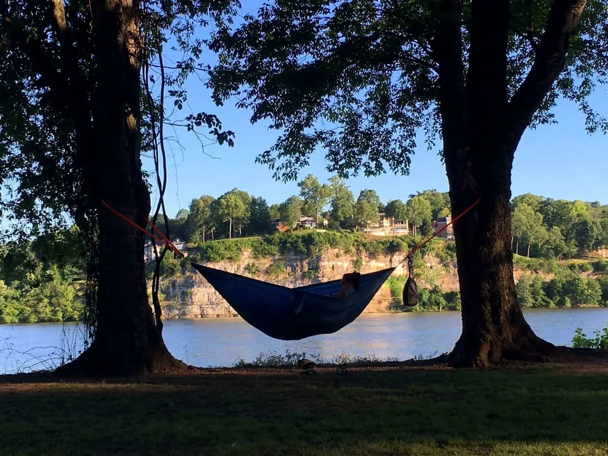 Joe Wheeler State Park is a popular spot for hammock camping. With an abundance of trees, perfectly spaced apart, hammocks dot the landscape. | 25 reasons to visit Florence, Alabama. | Photo courtesy of Miles Knowles, RockstarDiplomat.com | TravelingWellForLess.com