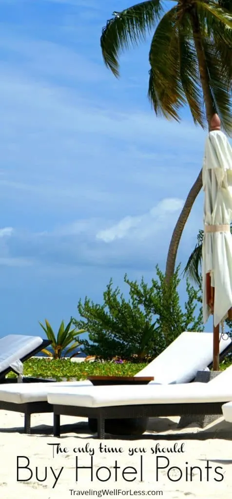 white chair on white sanded beach under palm tree