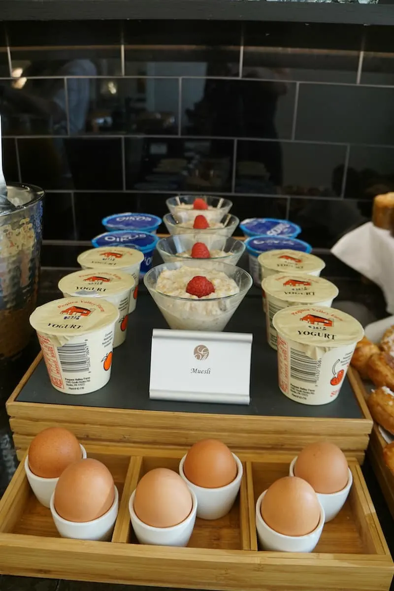 Breakfast at the Fairmont Washington DC Gold Lounge includes yogurts, eggs, and muesli.| Fairmont Washington DC | Fairmont Gold | luxury hotel | where to stay in Washington DC | TravelingWellForLess.com