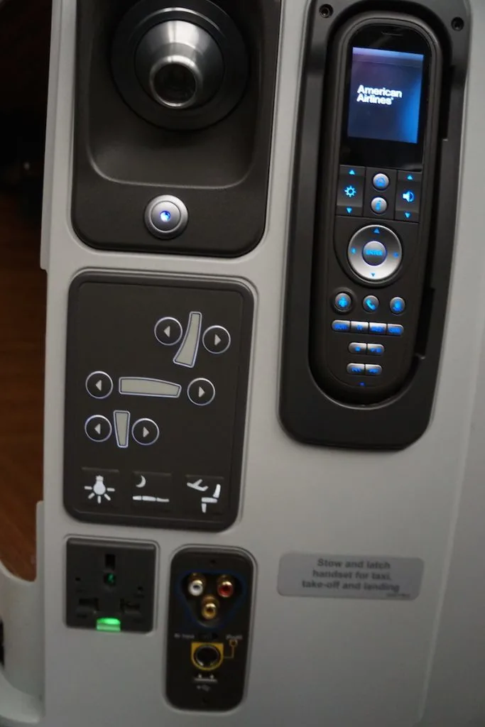 77W seat controls, inflight entertainmnt, and power ports. https://www.travelingwellforless.com