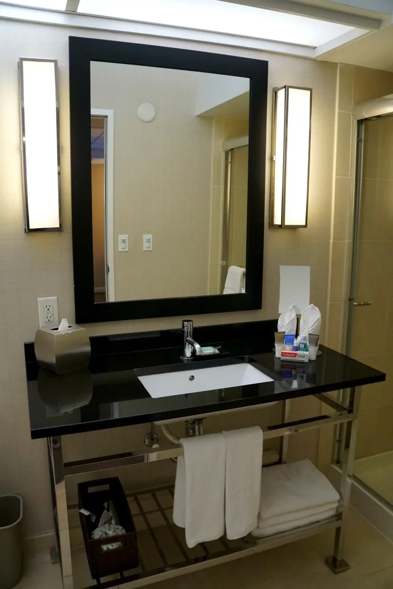 Stand alone sink in the bathroom in a corner suite in the Hyatt Regency Mission Bay Spa and Marina. TravelingWellForLess.com