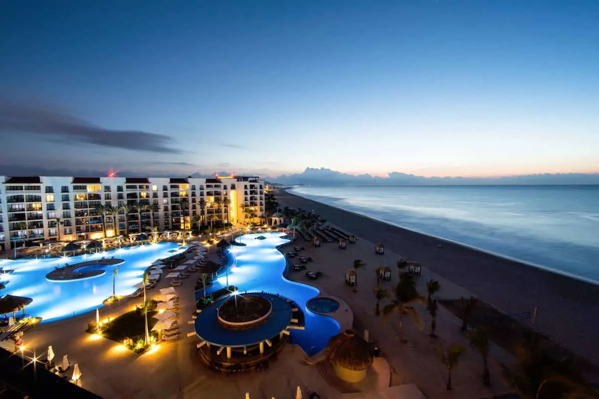 beachfront hotel at sunset