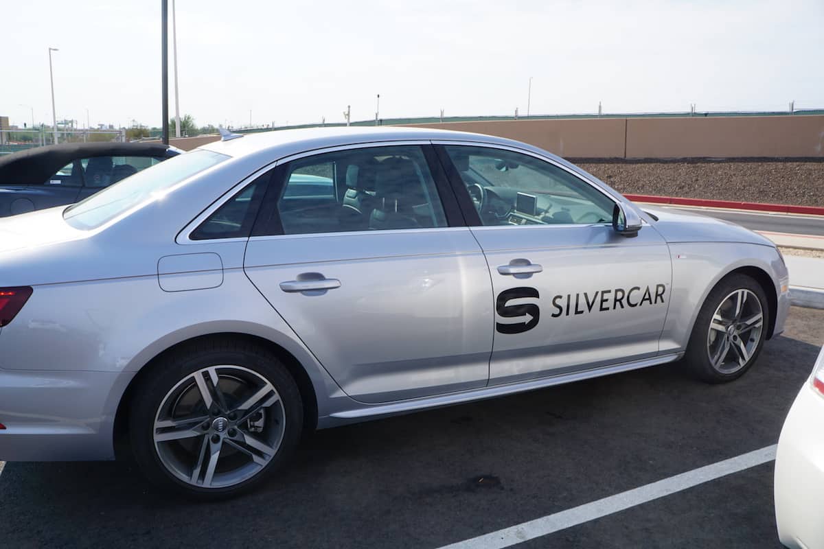 Most Silvercar locations are outside the airport. So they pick you up at the departures terminal.