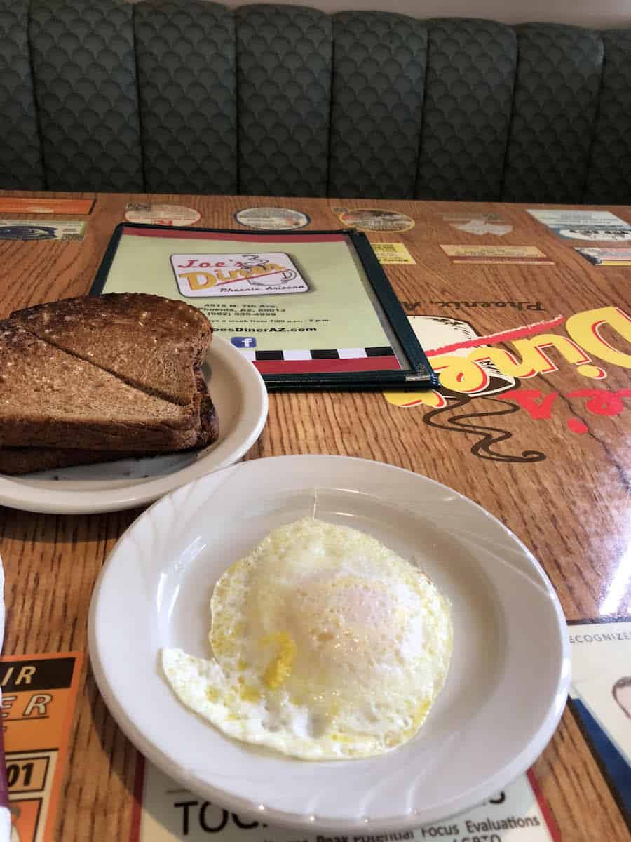 an egg and toast for $3.98, not including tax.