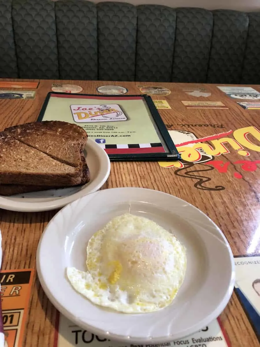 an egg and toast for $3.98, not including tax.