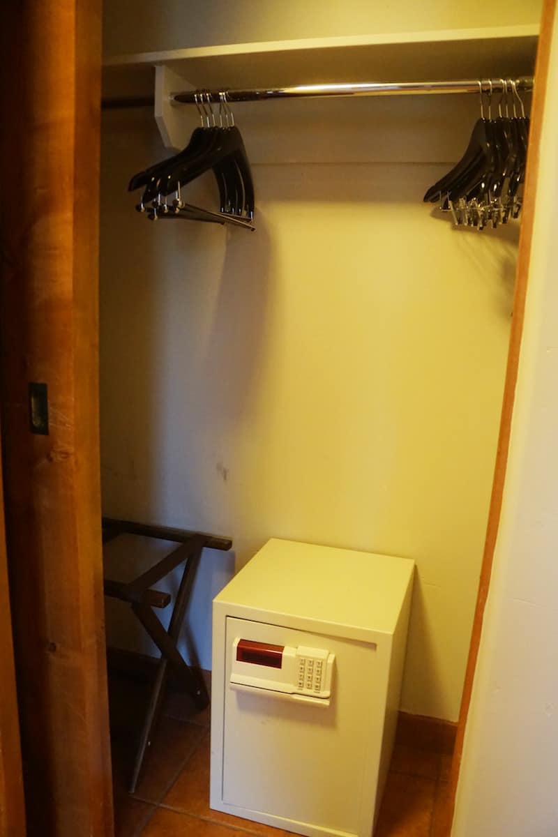 The master closet has a mini-fridge sized safe. There's a weird shelf/ledge so really big items don't fit. I was able to squeeze my laptop backpack in the safe.