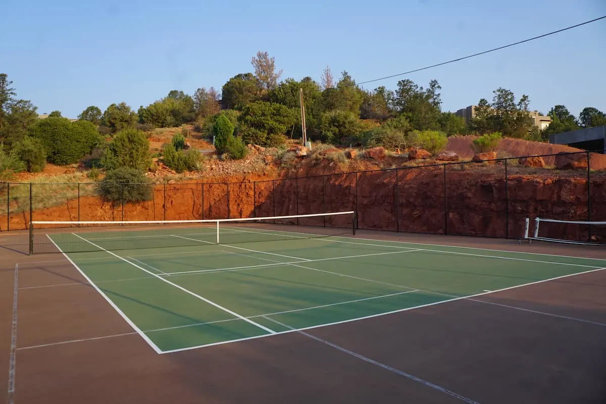 Keep your backhand in check by playing a few sets on the tennis court.