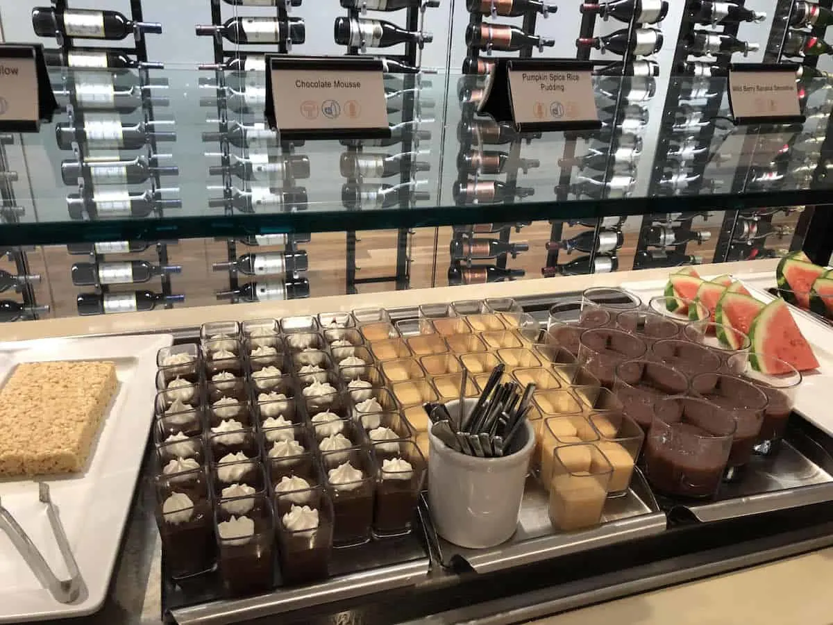 rice krispy treats, chocolate mousse, pumpkin spice pudding, smoothies, watermelon in the dessert buffet at Star Alliance Business Class Lounge LAX