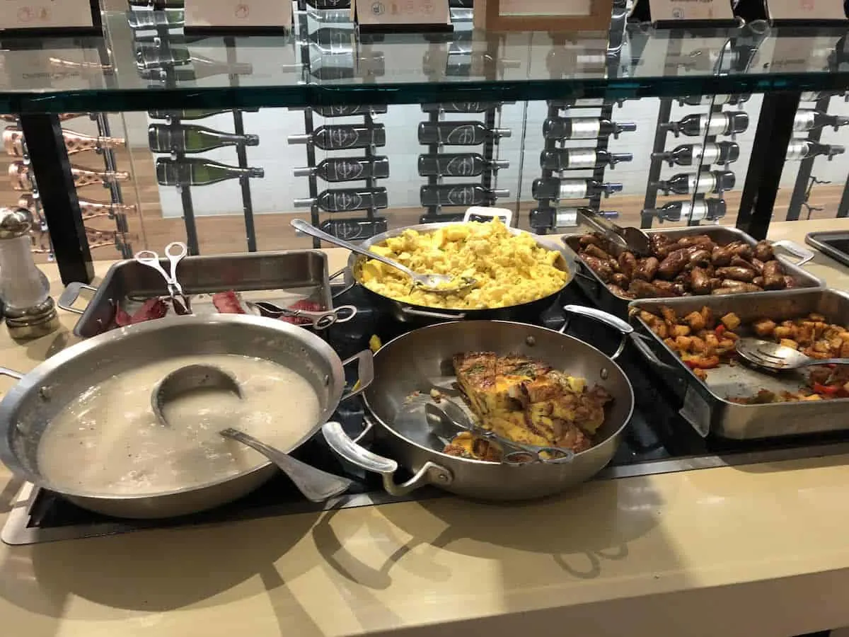 Eggs, quiche, sausage, potatoes, gravy Star Alliance Business Class Lounge LAX morning buffet