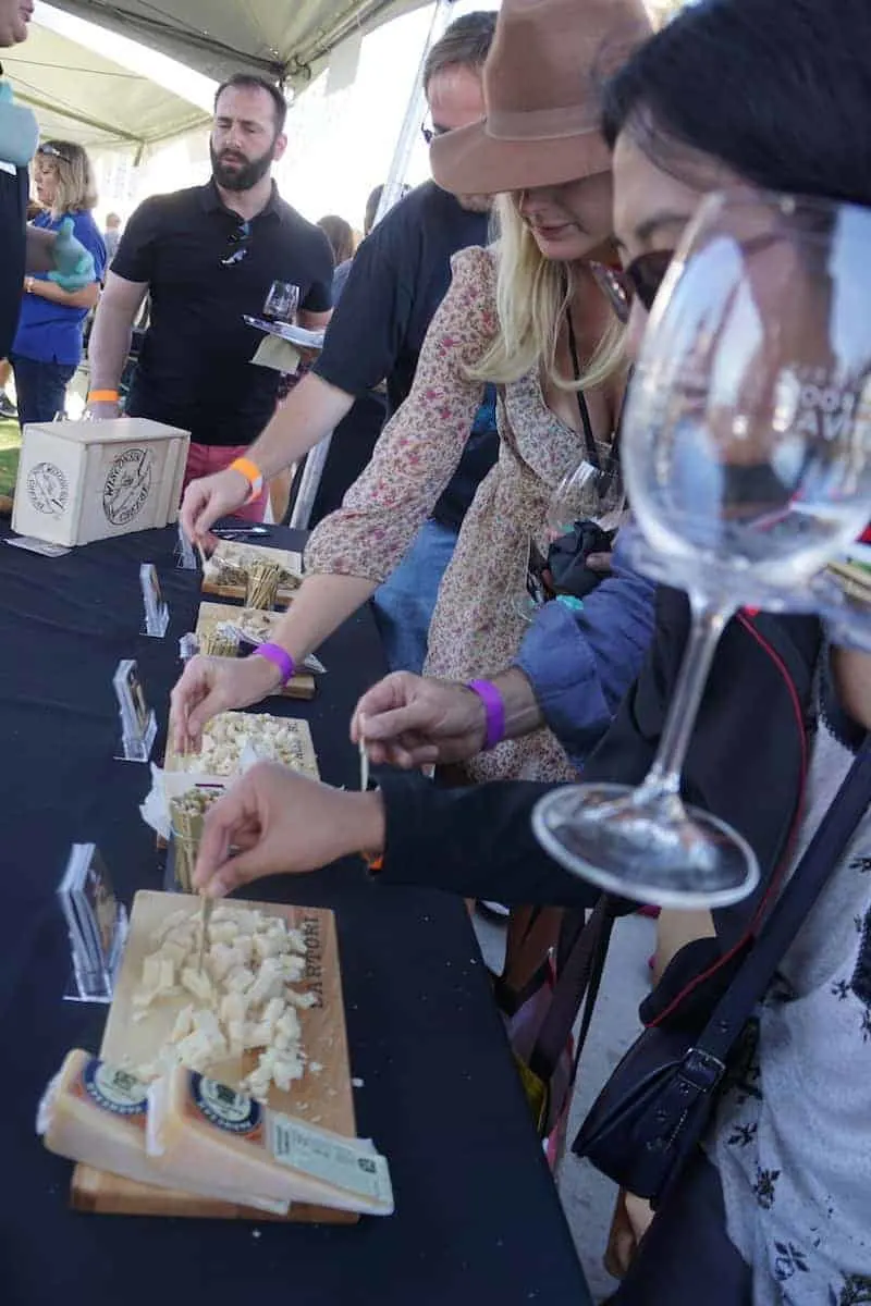 What's a wine tasting without a little cheese? Sartori brought their Montamore, Sarvecchio Parmesan, Merlot Bellavitano, and Black Pepper Bellavitano cheeses. | San Diego Bay Wine and Food Festival | things to do in San Diego | wine | TravelingWellForLess.com