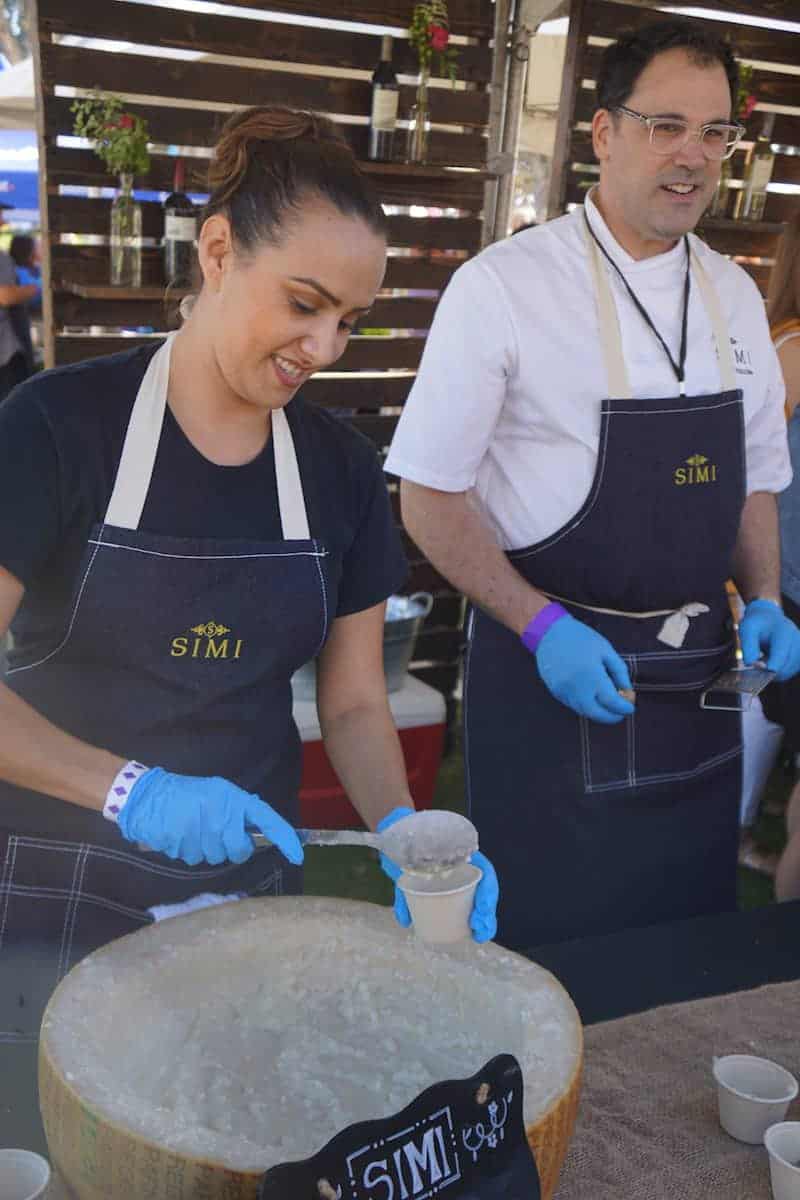 Chef Kolin Vazzoler crafted a sumptuous perfectly cooked risotto that was creamy, tender and cheesy. If Chef Vazzoler can prepare this delicious of a risotto under a tent over a gas flame, the food at SIMI Winery Kitchen must be remarkable. | San Diego Bay Wine and Food Festival | things to do in San Diego | wine | TravelingWellForLess.com