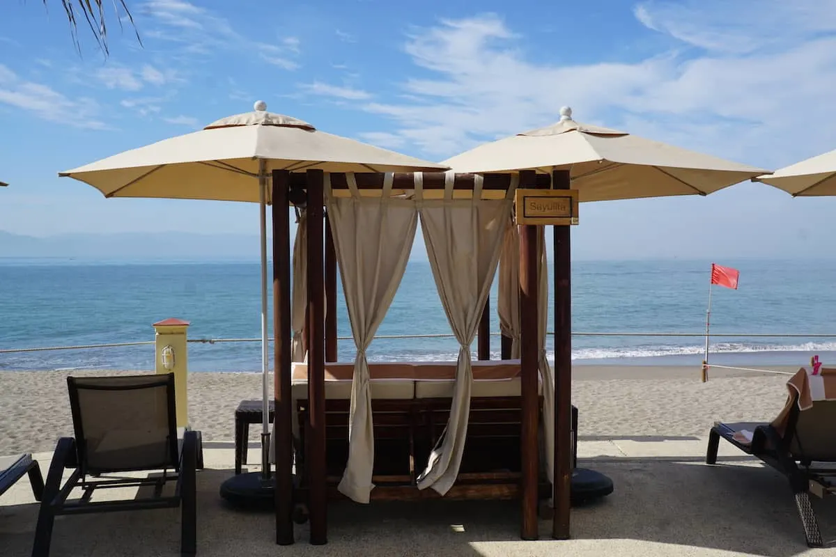 Make a reservation for one of several cabanas scattered throughout the pool area. | Marriott Puerto Vallarta Resort & Spa | where to stay in Puerto Vallarta | www.TravelingWellForLess.com