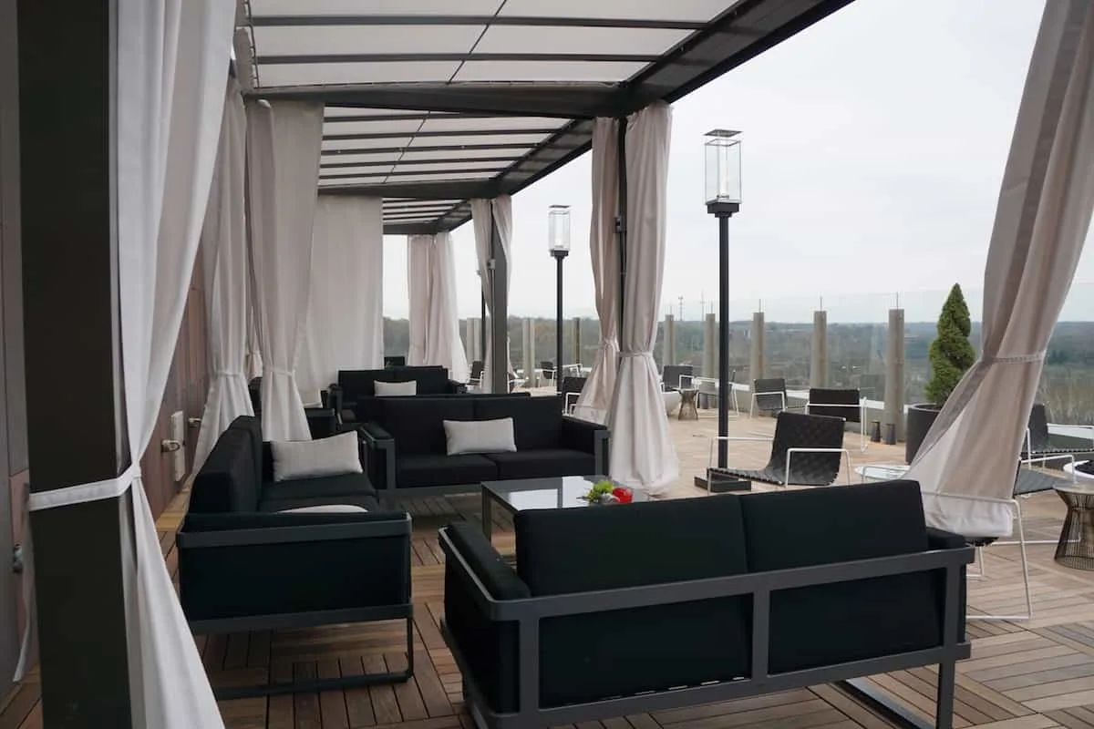 Enjoy tapas and drinks in a private cabana on the outside patio of VASO Rooftop Lounge. | Where to eat in Columbus, Ohio | Spanish food | AC Hotel Columbus Dublin | TravelingWellForLess.com