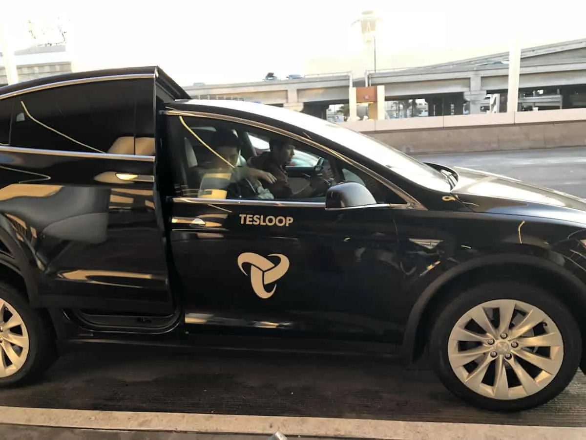 If you're looking for a way to get to LAX from San Diego consider using Tesloop. Tesloop can take you from San Diego to LAX in style and comfort in a Tesla. You'll share the ride with up to 2 other passengers. Unless you get lucky and are the only passenger. Which can happen sometimes or you book the entire car. | Tesloop San Diego to LAX | https://www.travelingwellforless.com