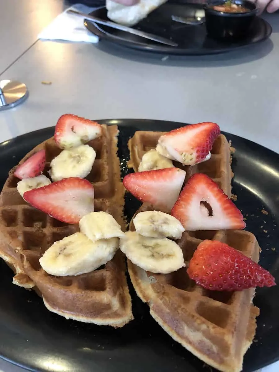 St Clair waffle with strawberries and bananas, Rooster Cafe, best things to do in Costa Mesa