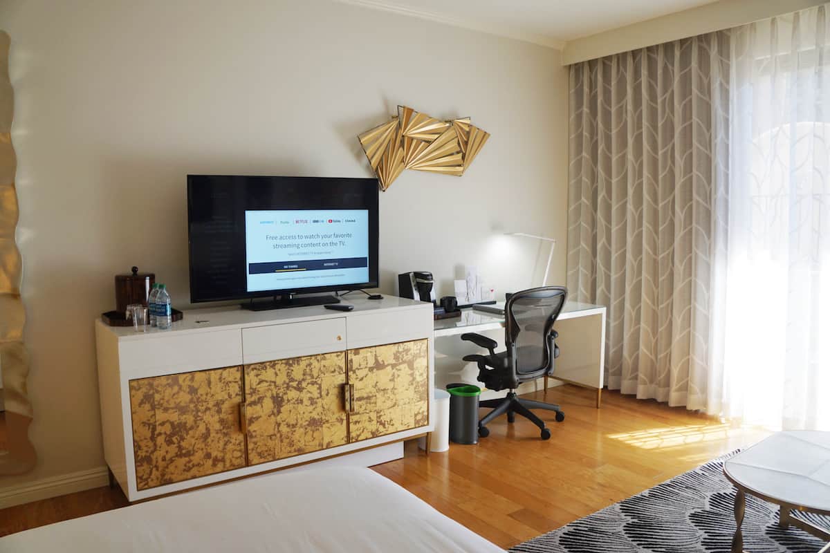 dresser, TV, work station in room at Avenue of the Arts Costa Mesa hotel