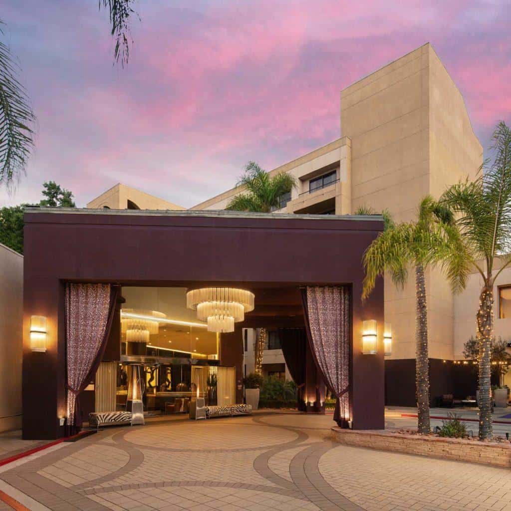 curtain flanked purple porte-cochere Avenue of the Arts Costa Mesa