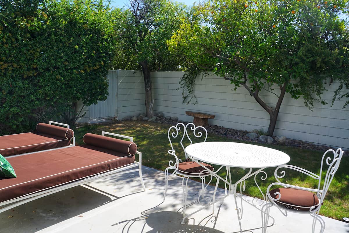 lounge chairs and table on patio