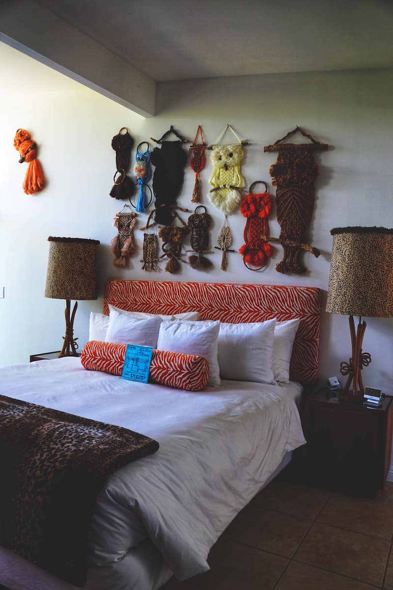 owl macrame above bed