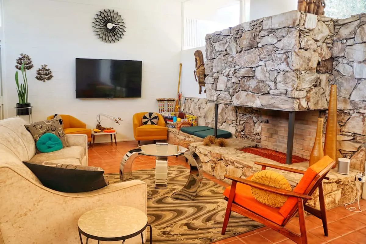 Mid-century couch, chairs, fireplace