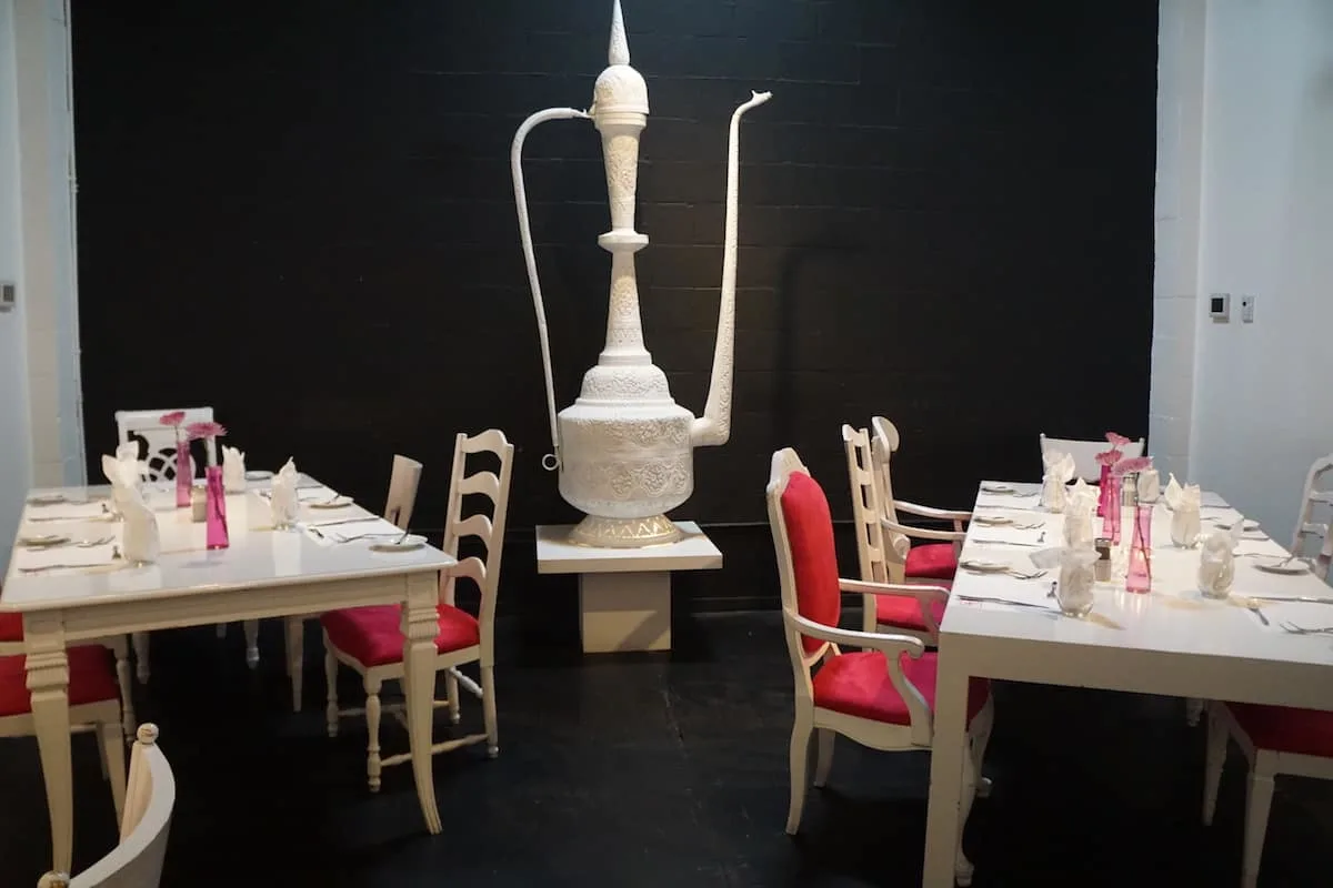 giant hookah in chic restaurant with white furniture