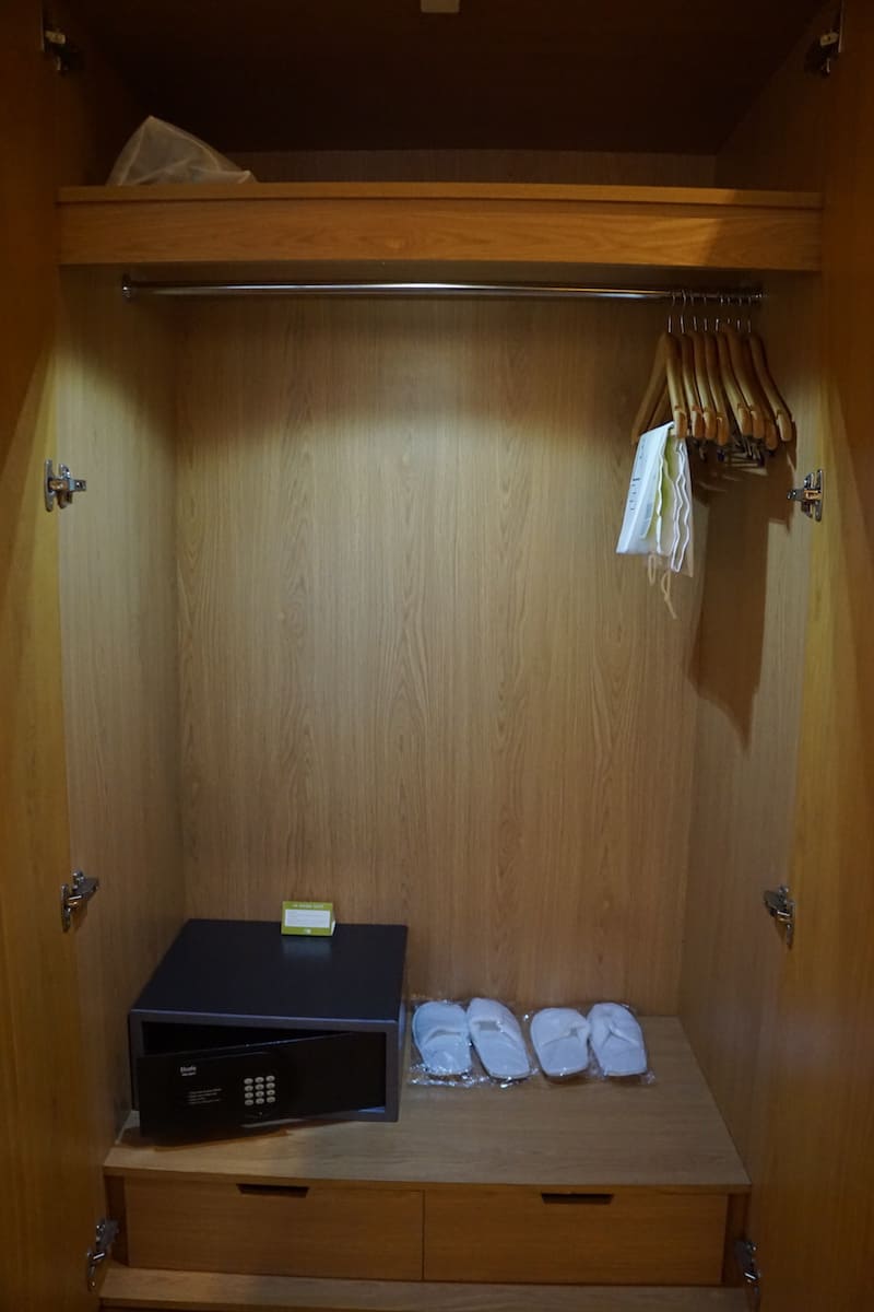 hotel suite closet with safe