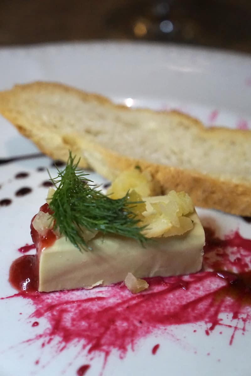 foie gras with apples and slice of bread