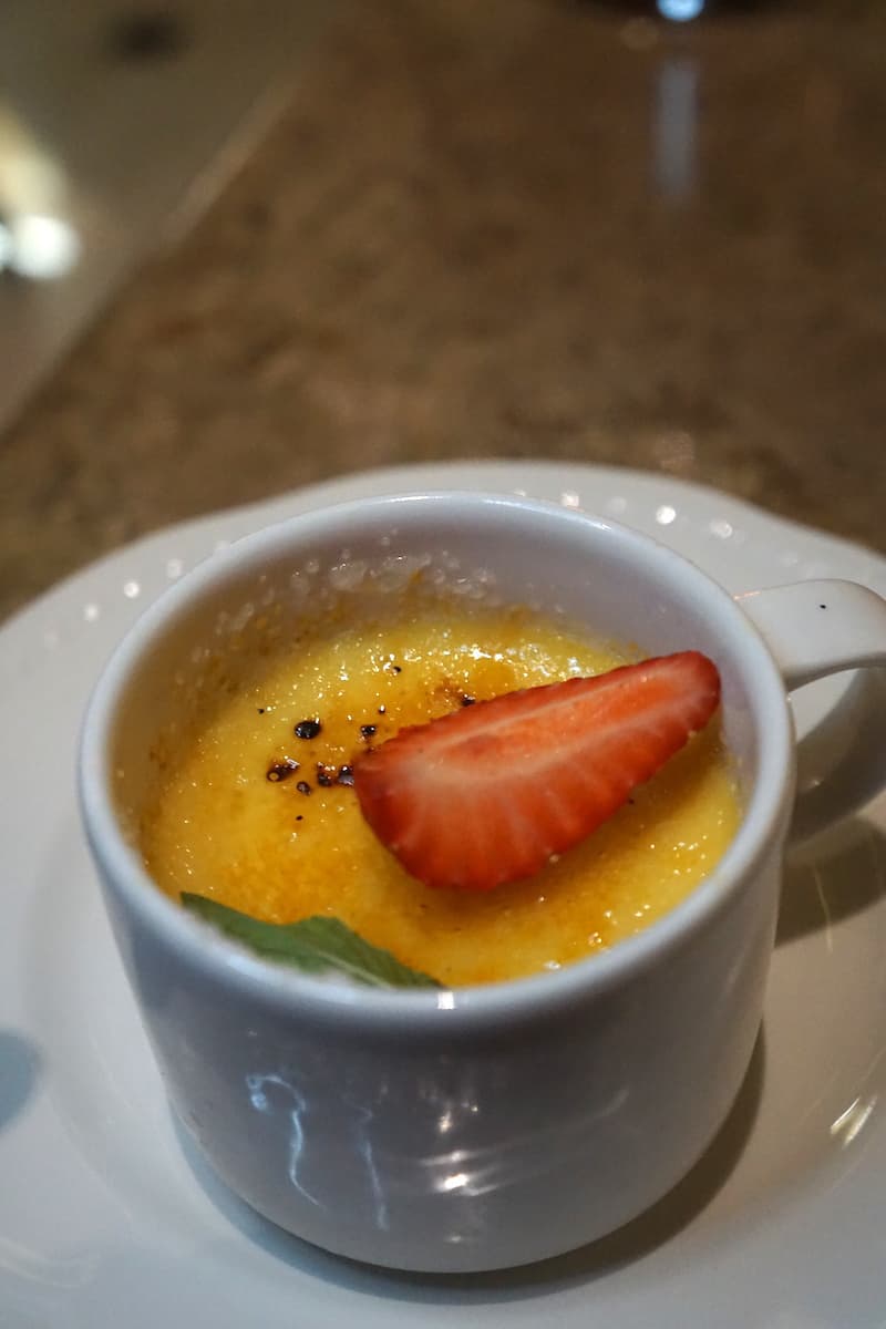 custard with crystalized top and strawberry slice