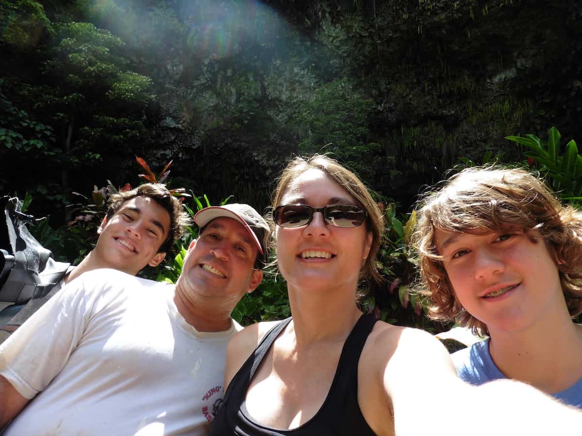 happy family in kauai after kayaking to waterfalls