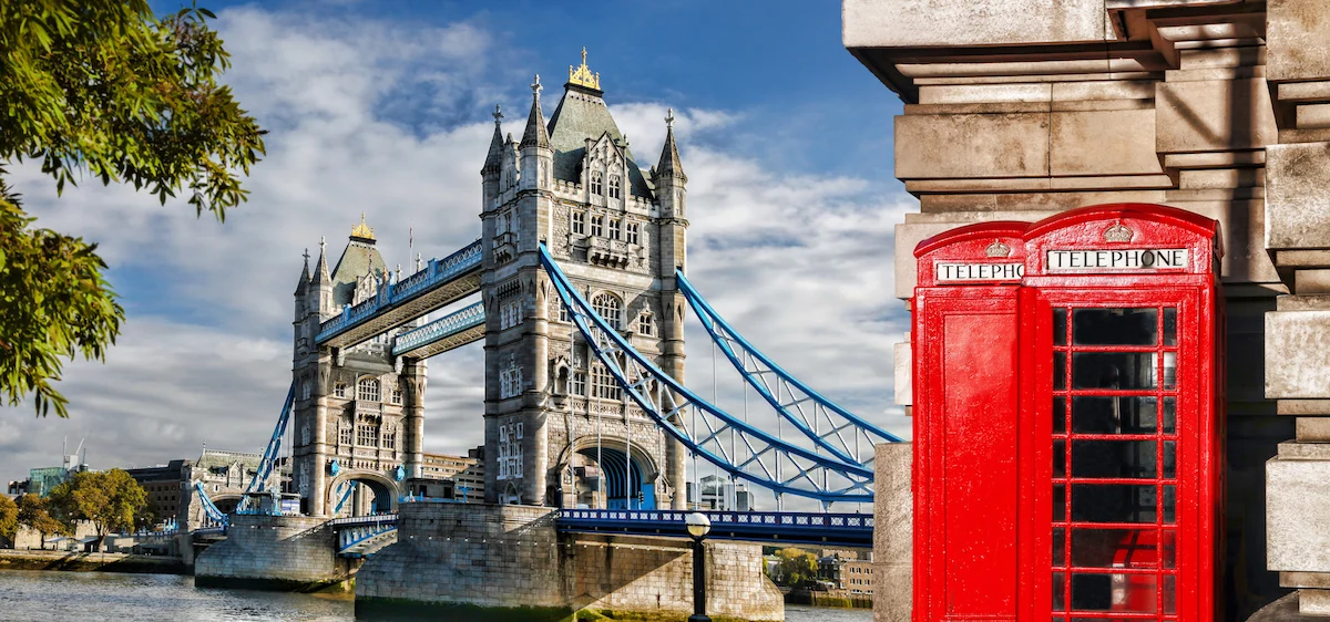 Tower Bridge with red phone booths in London, UK. $23,000 ten day trip to Europe for $633