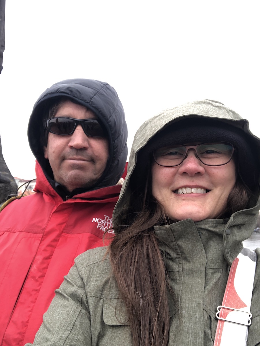 couple bundled in raingear