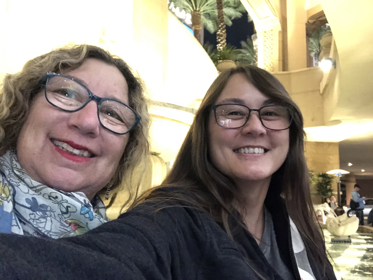 close up of two ladies sitting in front of the fountain at The Palazzo Las Vegas