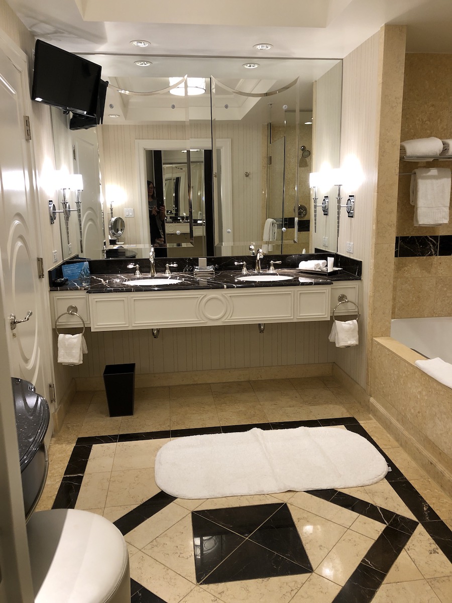 the palazzo las vegas suite bathroom with marble counters and tiled floors