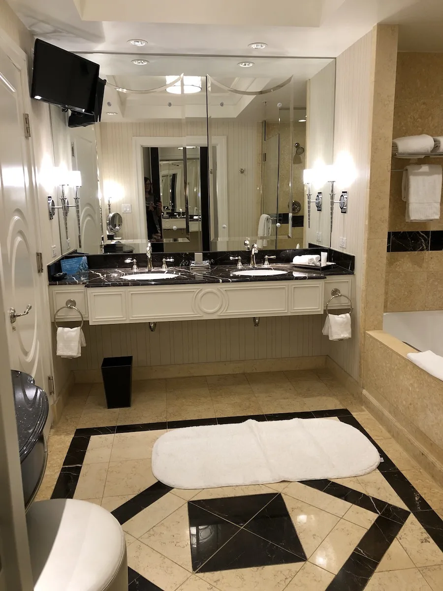 the palazzo las vegas suite bathroom with marble counters and tiled floors