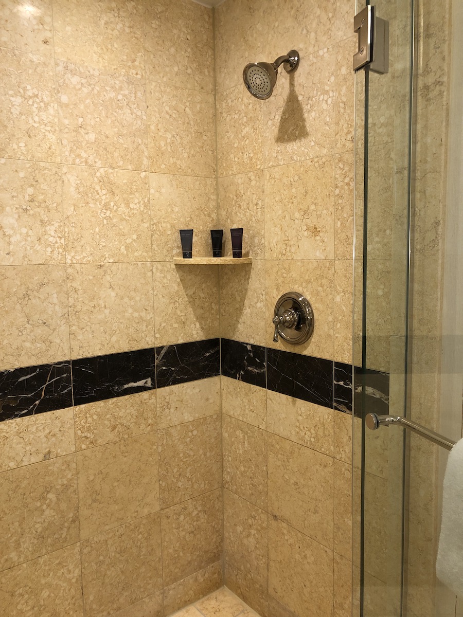 cream colored marble tiled in shower at the palazzo las vegas