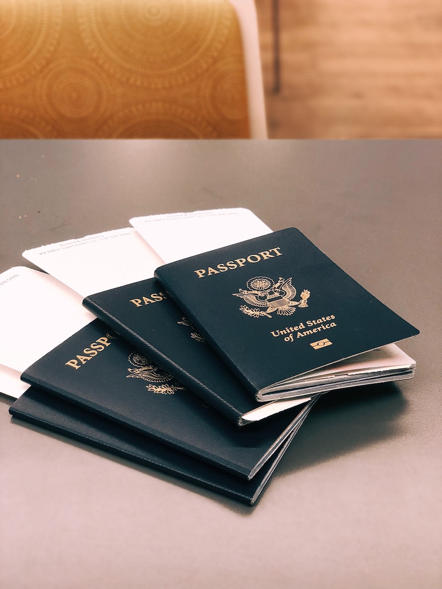 four blue passports, United States passports