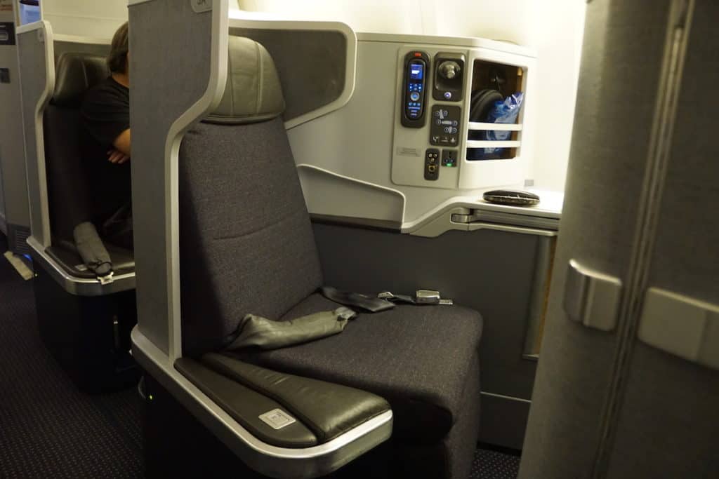 Blueish Business Class seat on American Airlines